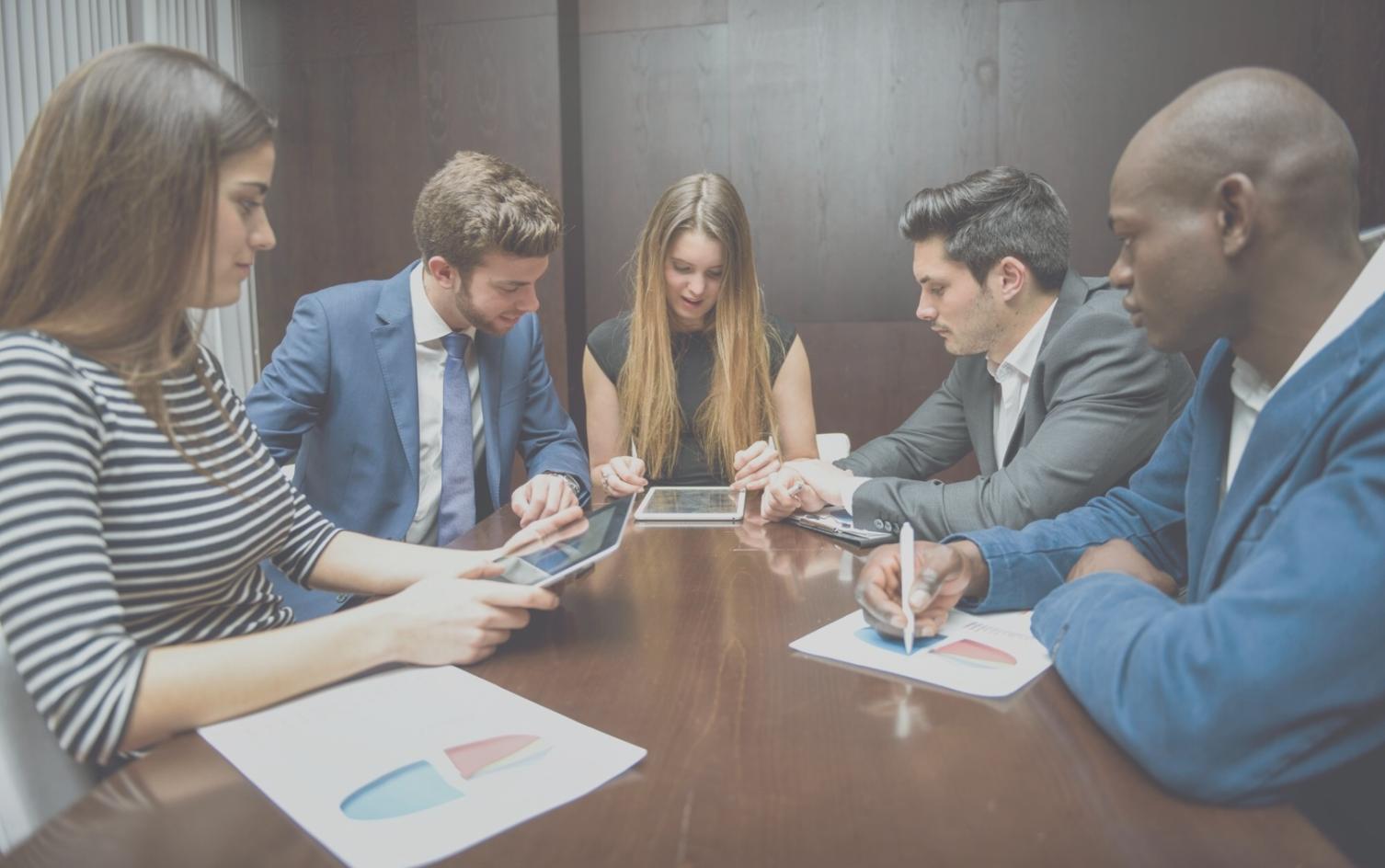 Financial planning session with charts and analysis documents